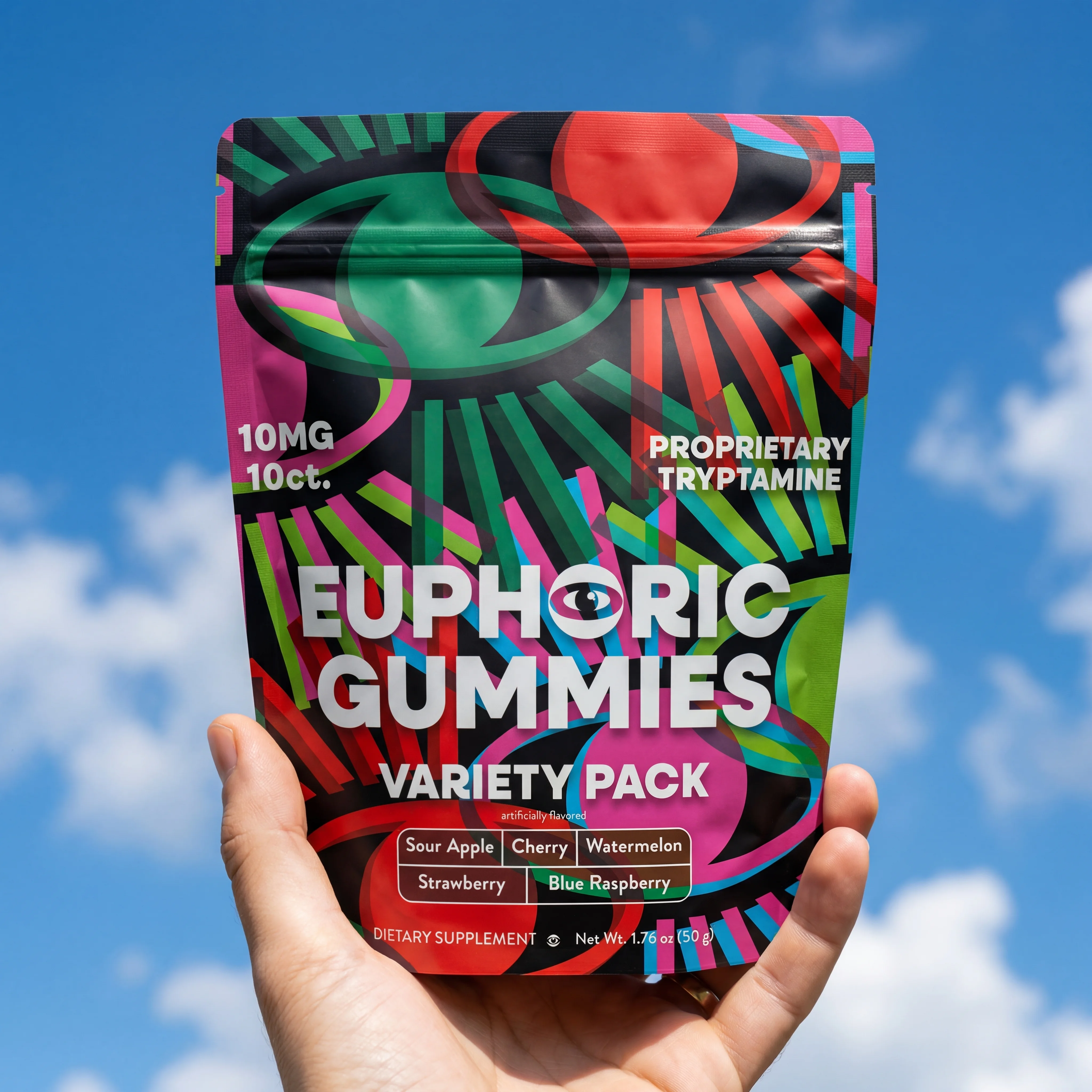 Holding Euphoric Gummies against blue sky